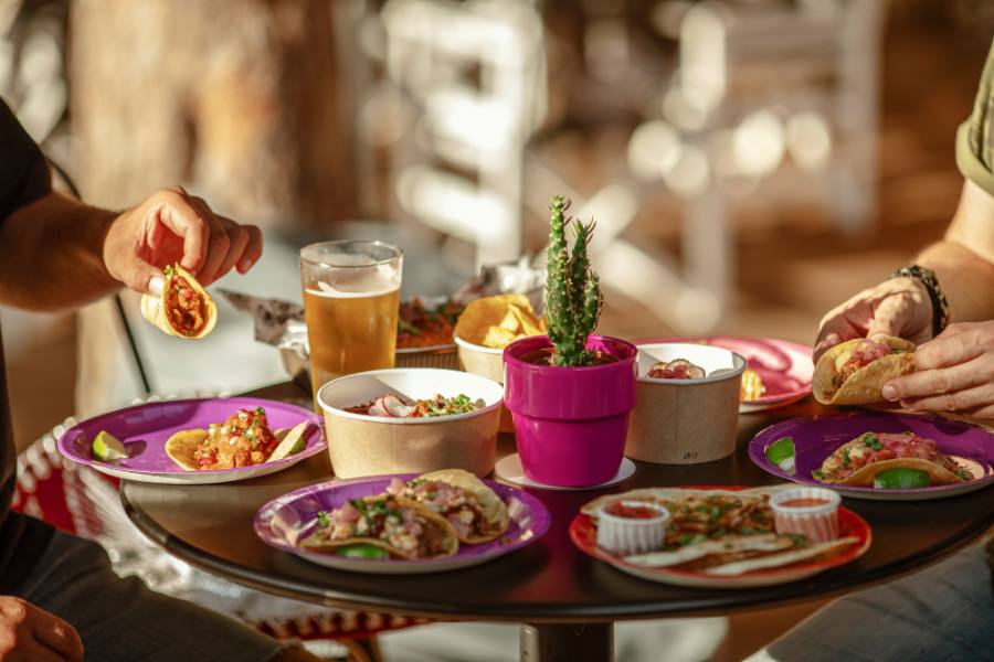 Group of people eating authentic Mexican food
